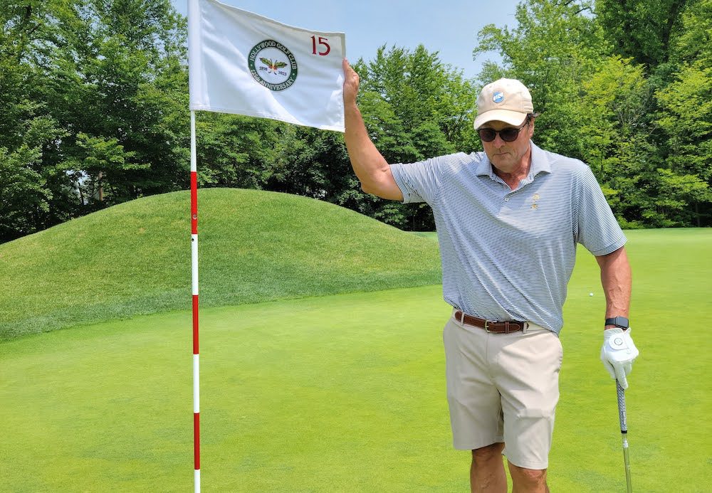 Not a bad day on the course: Chris Kelly made a hole-in-one and won a $76,000 Land Rover.